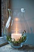 GLASS JAR WITH CANDLE AND MISTLETOE : STYLING BY JACKY HOBBS