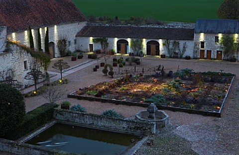 CHATEAU_DU_RIVAU__LOIRE_VALLEY__FRANCE_VIEW_OFTHE_POTAGER_AND_THE_GOLDEN_FLEET_BARN_FROM_THE_CHATEAU