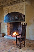 CHATEAU DU RIVAU  LOIRE VALLEY  FRANCE: DINING ROOM IN THE CHATEAU WITH FIREPLACE