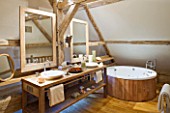 CHATEAU DU RIVAU  LOIRE VALLEY  FRANCE: MODERN BATHROOM WITH BATH  BASIN AND MIRROR