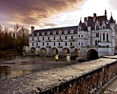 CHATEAU DE CHENONCEAU  LOIRE VALLEY  FRANCE: CHRISTMAS - VIEW OF THE CHATEAU WITH THE RIVER FLOWING BENEATH IT