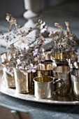 ROQUELIN  LOIRE VALLEY  FRANCE: DINING TABLE WITH SILVER TRAY AND TEA LIGHT HOLDERS WITH SILVER GREY HYDRANGEA FLOWERS