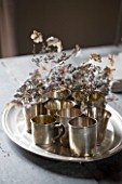 ROQUELIN  LOIRE VALLEY  FRANCE: DINING TABLE WITH SILVER TRAY AND TEA LIGHT HOLDERS WITH SILVER GREY HYDRANGEA FLOWERS