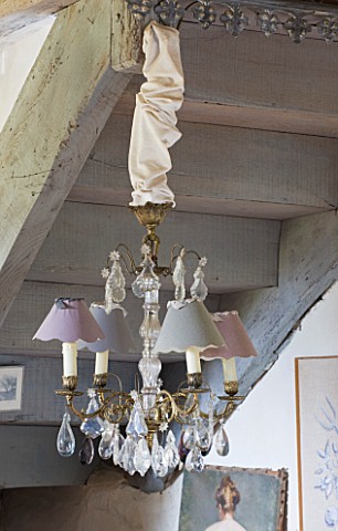 ROQUELIN__LOIRE_VALLEY__FRANCE_SITTING_ROOM_PASTEL_SHADED_DECORATIVE_GLASS_CHANDELIER_BENEATH_THE_ST