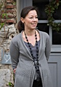 ROQUELIN  LOIRE VALLEY  FRANCE: OWNER ALINE CHASSINE OUTSIDE THE FRONT DOOR OF THE FARMHOUSE
