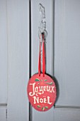 ROQUELIN  LOIRE VALLEY  FRANCE: METAL CHRISTMAS GREETING HANGS FORM A KEY ON THE DOOR