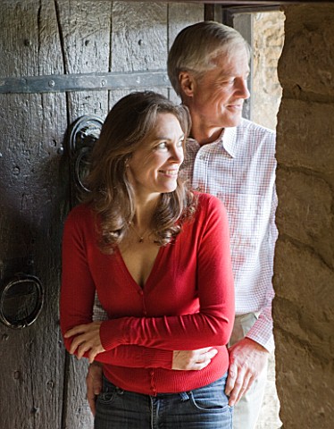 FULBROOK_HOUSE_OWNER_SIMON_GILL_AND_PARTNER_JACKY_HOBBS_IN_THE_HALLWAY_BESIDE_THE_DOOR