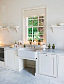 WHITE HOUSE: KITCHEN - WHITE MARBLE WORK SURFACES AND BUTLERS SINK