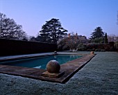 LOOKING TOWARDS THE HOUSE ACROSS THE SWIMMING POOL IN WINTER THE OLD RECTORY  BURGHFIELD  BERKSHIRE