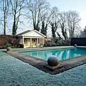 THE POOL GARDEN IN WINTER. THE OLD RECTORY  BURGHFIELD  BERKSHIRE
