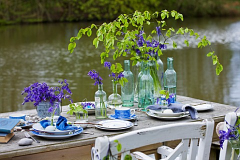 FISHING_COTTAGE__KNEBWORTH_PARK_STYLING_BY_JACKY_HOBBS_TABLE_AND_CHAIRS_ON_JETTY_BESIDE_LAKE__WITH_T