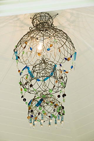 CHELSEA_2012__CHANDELIER_BMADE_FROM_OLD_WIRE_GARDEN_HANGING_BASKETS_BY_ANNABEL_LEWIS