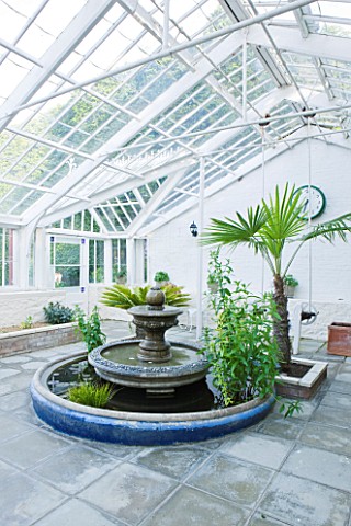 GRANGE_COURT__GUERNSEY_FOUNTAIN_IN_THE_RESTORED_GLASSHOUSE