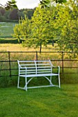 GIPSY HOUSE  BUCKINGHAMSHIRE: LAWN WITH METAL SEAT/ BENCH AND MEADOW
