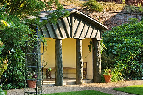 PECKOVER_HOUSE__WISBECH__CAMBRIDGESHIRE_THE_NATIONAL_TRUST__RUSTIC_SUMMER_HOUSE_IN_ALEXAS_ROSE_GARDE