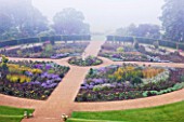 RAGLEY HALL GARDEN  WARWICKSHIRE: THE ROSE GARDEN IN MIST SEEN FROM THE ROOF OF THE HALL