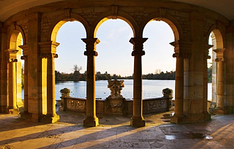 HEVER_CASTLE__KENT__AUTUMN_THE_ITALIAN_GARDENS_AT_DAWN__LOOKING_OUT_TO_THE_LAKE_FROM_THE_LOGGIA