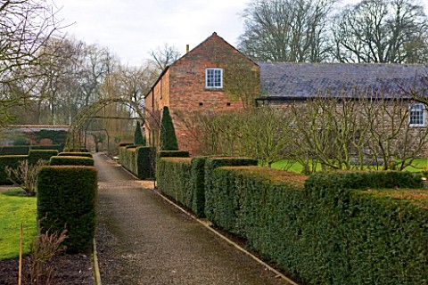 LITTLE_PONTON_HALL__LINCOLNSHIRE_YEW_HEDGES_IN_THE_WALLED_GARDEN