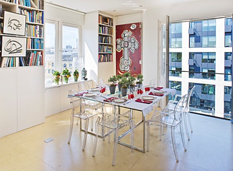 SHELLEY_VON_STRUNCKEL_APARTMENT__LONDON_DINING_AREA_WITH_TWO_HABITAT_TABLES_PUSHED_TOGETHER_TO_FORM_
