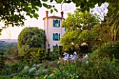 VILLA FORT FRANCE  GRASSE  FRANCE: THE VILLA WITH IRISES IN THE FOREGROUND