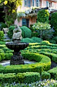 A CASELLA, FRANCE: GREEN PARTERRE, FOUNTAIN, CLIPPED, TOPIARY, MEDITERRANEAN, FRENCH, FORMAL, EVERGREENS, SUMMER, PROVENCE, HEDGES, HEDGING, BOX, BUXUS, WHITE WISTERIA