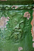 LA CASELLA, FRANCE: DETAIL OF GREEN GLAZED CONTAINER, POT