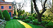 A CASELLA, FRANCE: LAWN, GRASS, TERRACE, CLIPPED, TOPIARY, BOX, BUXUS, HOUSE, VILLA, MEDITERRANEAN, PROVENCE, FRENCH, BLUE, SHUTTERS