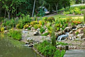 GARDEN IN KENT DESIGNED BY BELLA WHITELEY: LAKE WITH STREAM AND BEACH. POOL, WATER, CASCADE, SUMMER