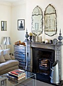 RICHARD CARNILL HOUSE  NOTTINGHAMSHIRE: SITTING ROOM - MARBLE FIRE PLACE  ANTIQUE VENETIAN MIRRORS  VINTAGE MEDICAL RECORD STORAGE CRATES  ORNAMENTS FROM CARNILL & COMPANY