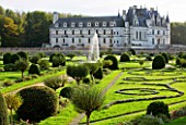CHATEAU DE CHENONCEAU  FRANCE: THE CHATEAU SEEN FROM DIANES GARDEN WITH SWIRLS OF SANTOLINA AND THE FOUNTAIN