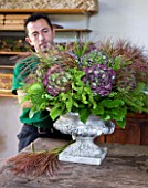 CHATEAU DE CHENONCEAU  FRANCE: FLORIST DAVID HOGUET MAKES A FLORAL ARRANGEMENT FOR THE CHATEAU FROM HYDRANGEAS AND GRASSES CUT FROM THE CUTTING GARDEN