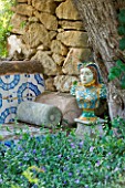 SICILY  ITALY: SAN GIULIANO ESTATE: BUST OF CATHERINE DE MEDICI IN THE SEATING AREA IN THE ARABIC GARDEN