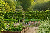 ROCKCLIFFE HOUSE  GLOUCESTERSHIRE: THE WALLED VEGETABLE/ KITCHEN GARDEN WITH CLOCHES AND RAISED BEDS