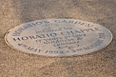 HORATIOS GARDEN  SALISBURY HOSPITAL  WILTSHIRE - DESIGNER CLEEVE WEST - STONE ON THE GROUND COMMEMORATING THE LIFE OF HORATIO CHAPPLE