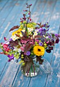 COMMON FARM FLOWERS, SOMERSET, SUMMER: FRESHLY CUT FLOWERS IN GLASS CONTAINER ON BLUE BENCH / TABLE - FLOWER, FLOWERS, BOUQUET, DISPLAY, ARRANGEMENT, FLORAL