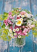 COMMON FARM FLOWERS, SOMERSET, SUMMER: FRESHLY CUT FLOWERS IN GLASS CONTAINER ON BLUE BENCH / TABLE - FLOWER, BOUQUET, DISPLAY, ARRANGEMENT, FLORAL, SWEET WILLIAM, ALCHEMILLA