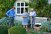 WOOLSTONE MILL HOUSE, OXFORDSHIRE: OWNER JUSTIN SPINK WITH PARENTS PENNY AND ANTHONY AND THEIR DOG IN FRONT OF THE HOUSE