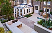 PRIVATE GARDEN LONDON: DESIGNER STEPHEN WOODHAMS - TOWN GARDEN - ROOF GARDEN WITH SEATING AND PAVING, ORANGERY BY MARSTON AND LANGINGER - SUMMER, MINIMAL, CONTEMPORARY