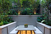 PRIVATE GARDEN LONDON: DESIGNER STEPHEN WOODHAMS - TOWN GARDEN - BACK GARDEN TABLE AND CHAIRS FOR DINING WITH LIGHTING. LIT, FORMAL, A PLACE TO SIT, RAISED BED, CITY GARDEN