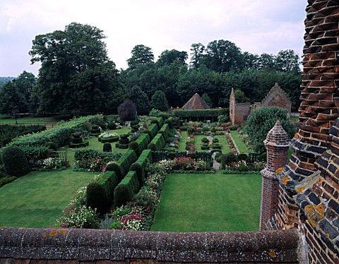 AERIAL_VIEW_FROM_THE_ROOF_OF_CHENIES_MANOR__BUCKS_SHOWING_YEW_WALK_BETWEEN_GARDEN_ROOMS_THE_WHITE_GA