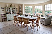 BRILLS FARM  LINCOLNSHIRE: DINING AREA WITH WOODEN TABLE AND CHAIRS