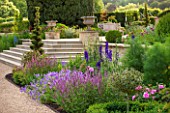 PRIVATE GARDEN, GLOUCESTERSHIRE - DESIGNER ANGEL COLLINS - TERRACE, STEPS, SALVIA, DELPHINIUMS, ROSES, FENNEL. HOUSE, COUNTRY, GARDEN, FORMAL