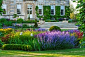 PRIVATE GARDEN, GLOUCESTERSHIRE - DESIGNER ANGEL COLLINS - BORDER BY LAWN  - HOUSE, SALVIA MAINACHT, IRIS, ASTRANTIA HADSPEN BLOOD, NEPETA WALKERS LOW, FORMAL, COUNTRY