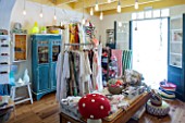 CIUTADELLA MENORCA, SPAIN: EVELYNE MANDEL HOUSE - THE SHOP FILLED WITH CLOTHING AND HOMEWARE