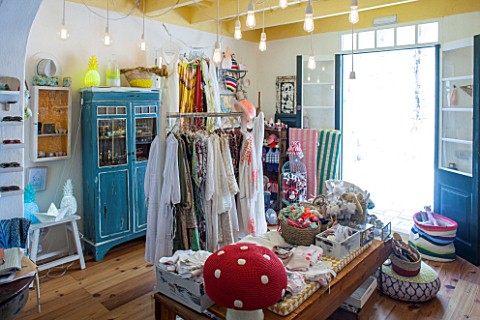 CIUTADELLA_MENORCA_SPAIN_EVELYNE_MANDEL_HOUSE__THE_SHOP_FILLED_WITH_CLOTHING_AND_HOMEWARE