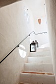 CIUTADELLA MENORCA, SPAIN: EVELYNE MANDEL HOUSE - STAIRCASE TO ROOF TERRACE PAINTED WHITE WITH BLACK LANTERNS