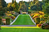 RHS GARDEN, WISLEY, SURREY: THE FAMOUS DOUBLE MIXED BORDER IN SEPTEMBER STRETCHING 128 METRES DOWN THE HILL - GRASS, PERENNIALS, SUMMER, GARDEN, CLASSIC