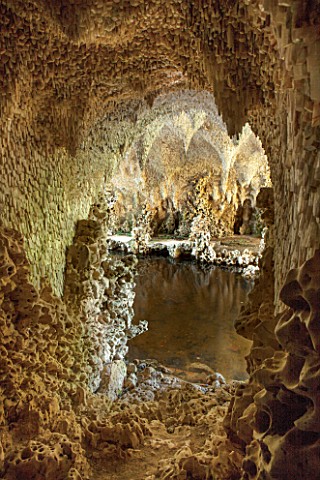 PAINSHILL_PARK_SURREY_THE_CRYSTAL_GROTTO__VIEW_THROUGH_WINDOW_OPENING_TO_LAKE_AND_REFLECTIONS__CLASS