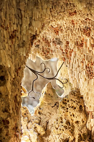 PAINSHILL_PARK_SURREY_THE_CRYSTAL_GROTTO__VIEW_THROUGH_WINDOW_OPENING__CLASSIC_OOLITIC_LIMESTONE_STA