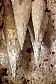 PAINSHILL PARK, SURREY: THE CRYSTAL GROTTO - CLOSE UP OF CRYSTALS PLASTERED TO WOODEN CONES ON CEILING - CLASSIC, OOLITIC LIMESTONE, MYSTERY, LANDSCAPE GARDEN, ORNAMENT